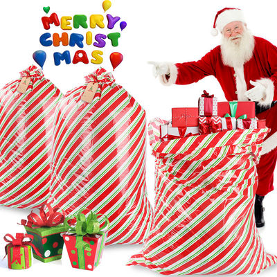 Bolsos gigantes a prueba de humedad del regalo de la Navidad del LDPE con las etiquetas
